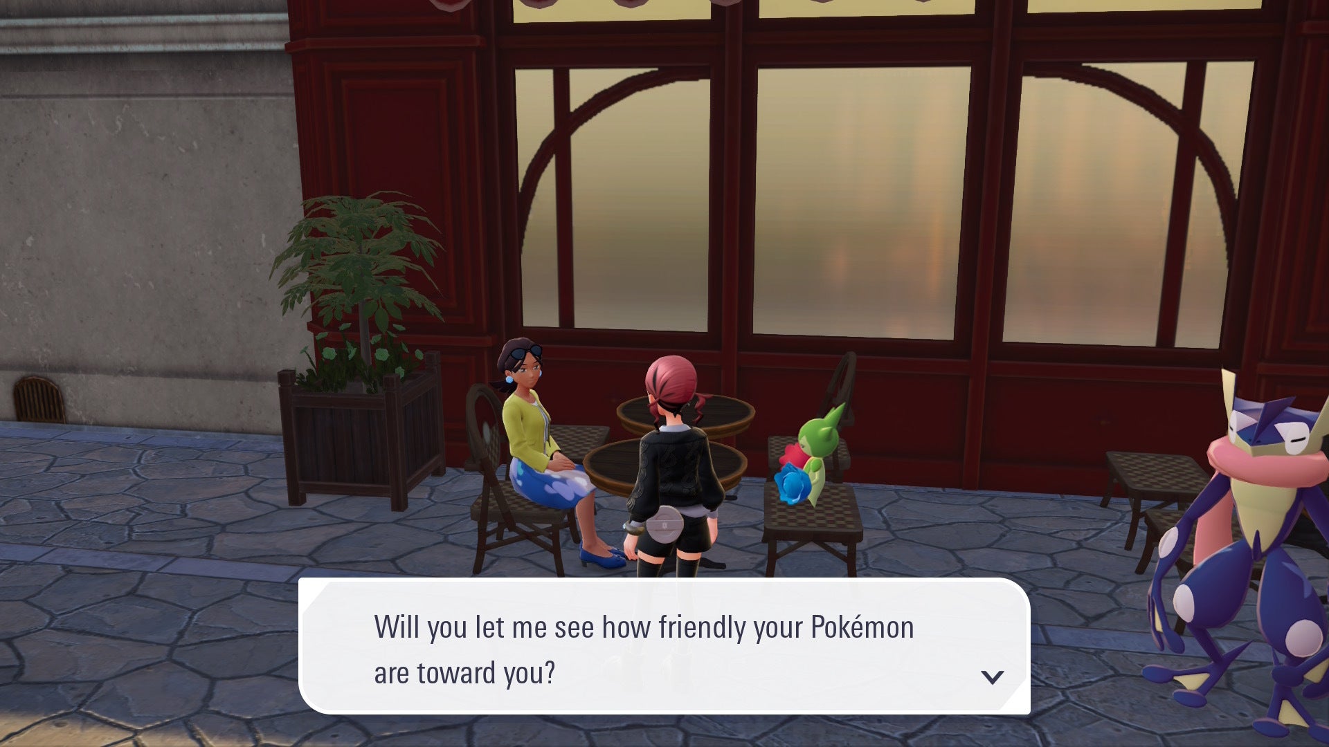 Игрок разговаривает с NPC, проверяющим дружбу, в кафе Pokemon Amie в Pokémon Legends Z-A